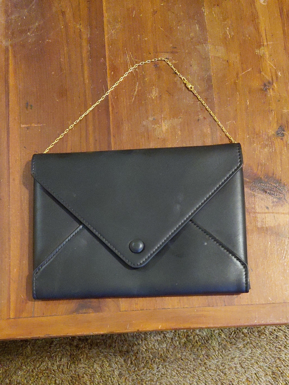The Row Black Envelope Clutch with Gold Chain